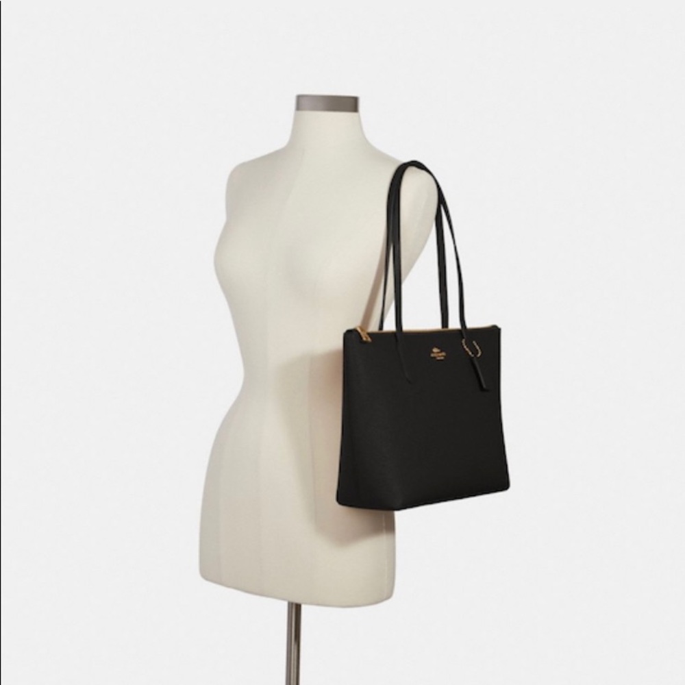 Coach black zip top tote